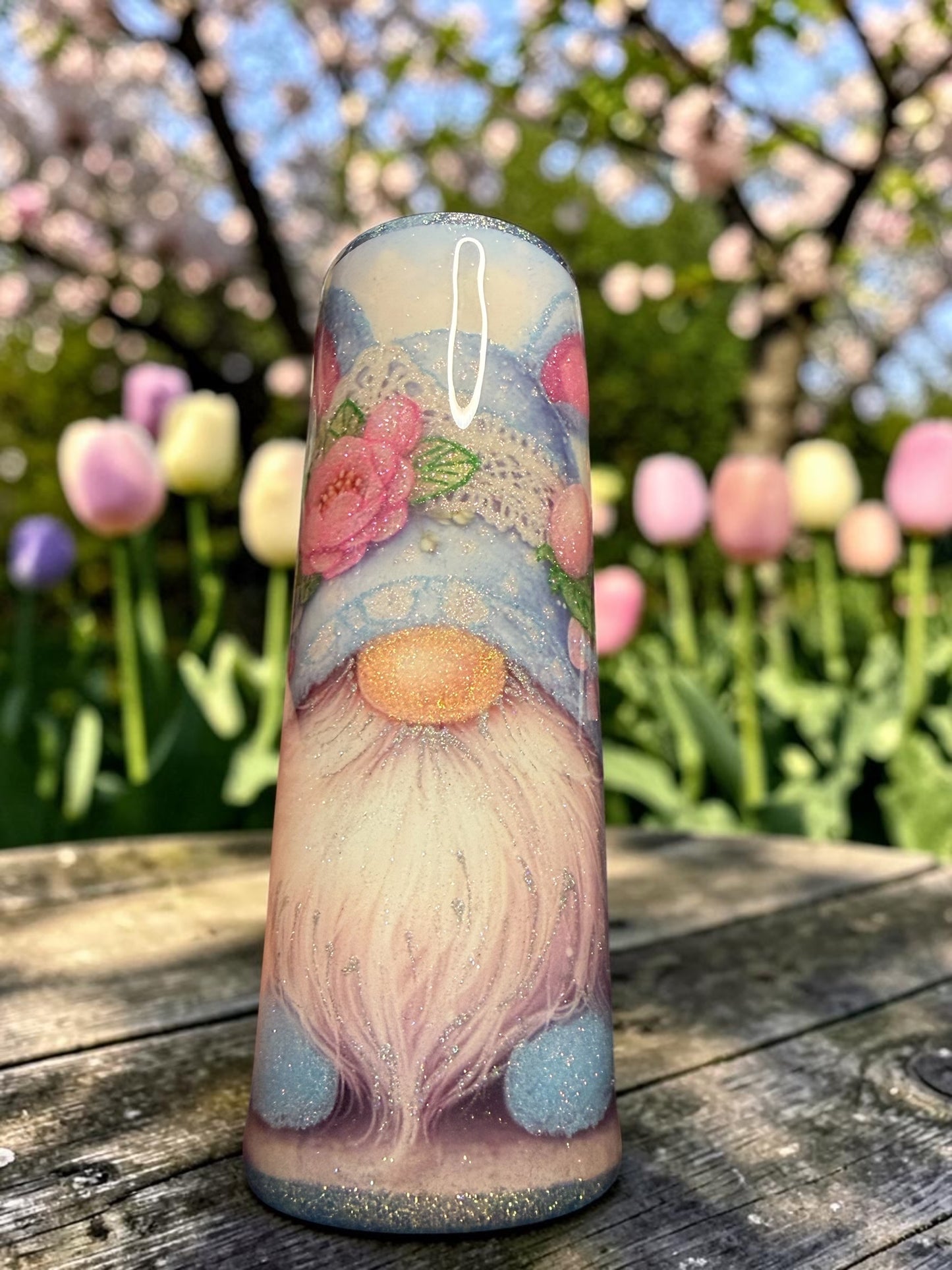 30 ounce gnome, wearing a bunny, eared hat